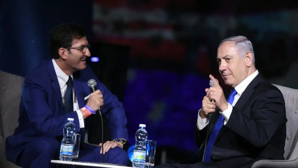 “Israel Hayom” editor in chief Boaz Bismuth with Israeli Prime Minister Benjamin Netanyahu in Jerusalem on June 28, 2019. Photo by Yossi Zeliger.