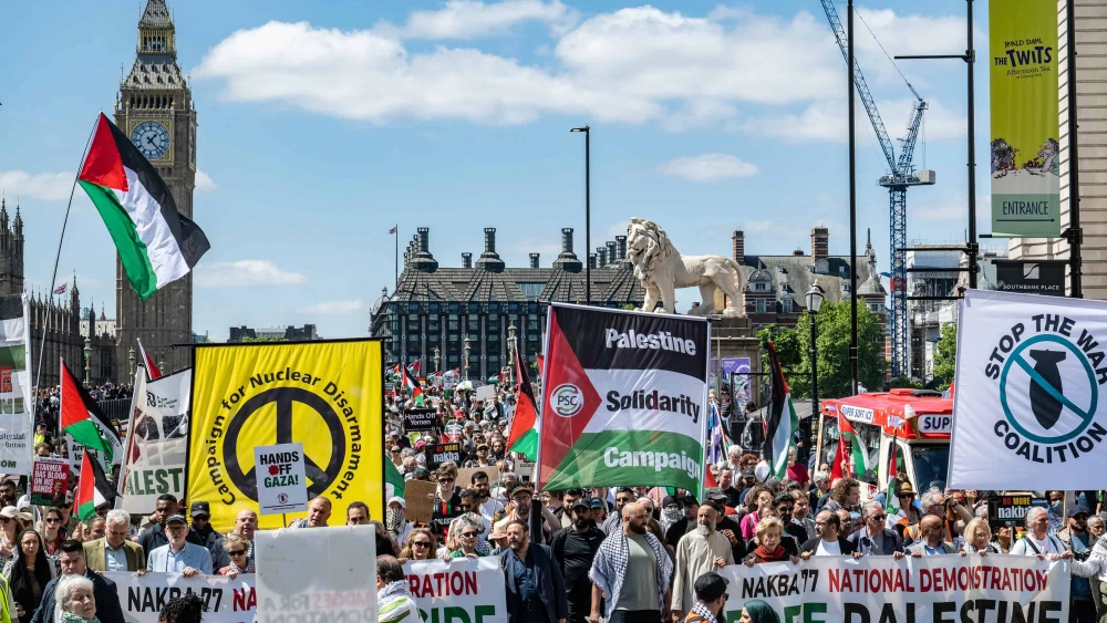 Protesters pass over Westminster Bridge during the National March For Palestine in London, England, on May 17, 2025, marking the 77th anniversary of what the Palestinians call the "Nakba" (catastrophe) following the creation of the State of Israel. Photo by Guy Smallman/Getty Images.