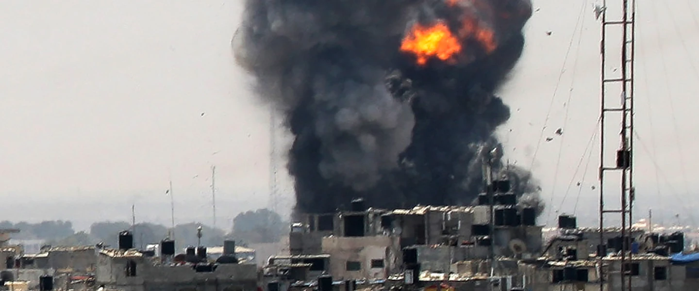 Smoke and fire rise from a location reportedly belonging to Hamas, following an Israeli airstrike in the southern Gaza town of Rafah on July 14, 2018. Photo by Abed Rahim Khatib/Flash90.