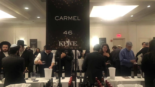Industry insiders sample myriad wines and spirits during the Kosher Food & Wine Experience. Credit: Courtesy of Royal Wine Corp.