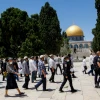 Israeli security forces escort a group of religious Jews as they visit the Temple Mount in Jerusalem's Old City, after it was reopened to the public, May 31, 2020. Photo by Sliman Khader/Flash90.