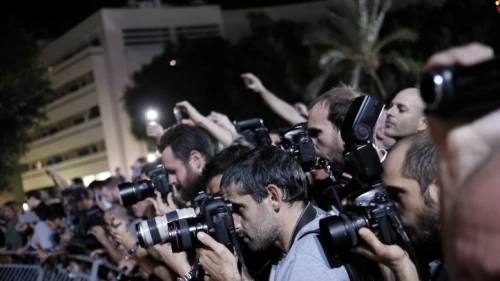 Photojournalists capture protests in central Tel Aviv against a controversial agreement reached over the past few months between the government and large energy companies over natural-gas production, Nov. 14, 2015. Photo by Tomer Neuberg/Flash90.