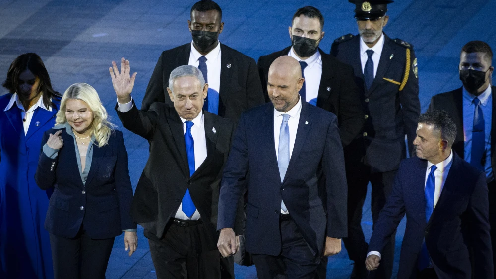 Israeli Prime Minister Benjamin Netanyahu and his wife, Sara, with Knesset Speaker Amir Ohana at the 78th anniversary Independence Day ceremony, held at Mount Herzl, Jerusalem, on April 21, 2026. Photo by Chaim Goldberg/Flash90.