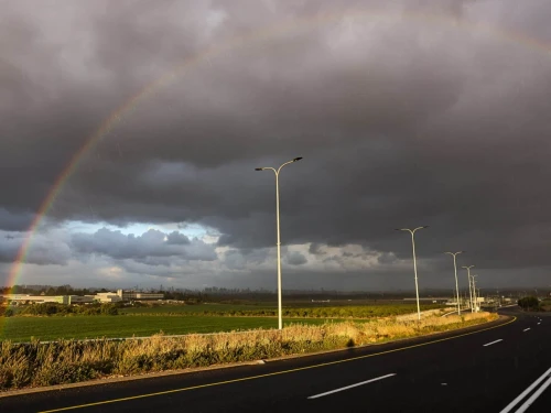 A rainbow is seen during rainfall in Rosh HaAyin, Feb. 7, 2025. Photo by Yossi Aloni/Flash90.