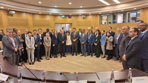 MKs Danny Danon (center, wearing red tie) and Ram Ben Barak (behind Danon's left shoulder) meet with foreign diplomats at the Knesset to discuss post-war Gaza, Jan. 10, 2024. Credit: The Knesset Spokespersons Office.