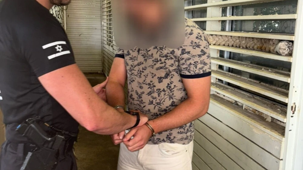 Omar Kosi, the Turkish employee, caught filiming underage girls is arrested by Israeli police, July 25, 2025. Credit: Israeli Police Spokesperson's Office.