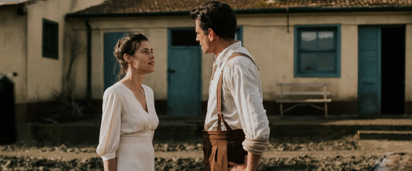 Yehudit Salomon (played by Ana Ularu) and Moshe Rabinovich (played by Alban Ukaj) in the Hebrew-English 2025 film “For the Love of a Woman.” Photo by Vincenzo Aluia ©2023 Colorado Film Production, Vivo Film.