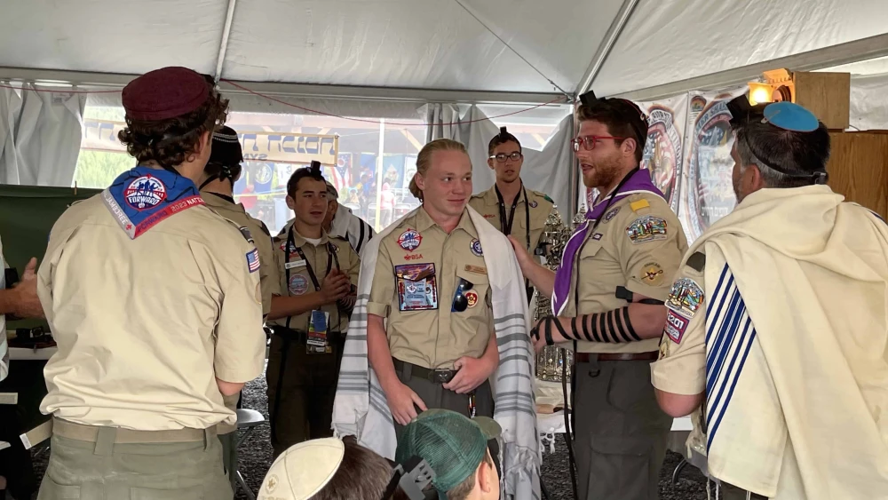 Jewish Scout Coulton Perrmann, 15, is called to the Torah at the 2023 National Scout Jamboree in Glen Jean, W.V., on July 24, 2023. Photo by the National Boy Scouts of America (BSA).