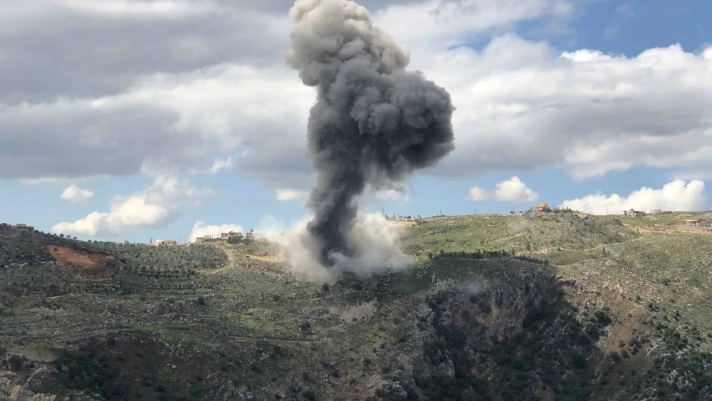 Smoke billows from the site of Israeli artillery shelling that targeted the area of the southern Lebanese village of Yohmor in response to rocket fire, on March 22, 2025. Photo by Rabih Daher/AFP via Getty Images.