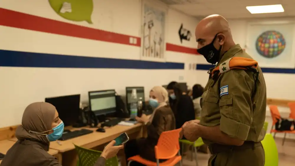 The military has also launched a massive outreach campaign to its own units to elevate awareness and ensure compliance with infection-prevention protocol. Credit: IDF Spokesperson's Unit.