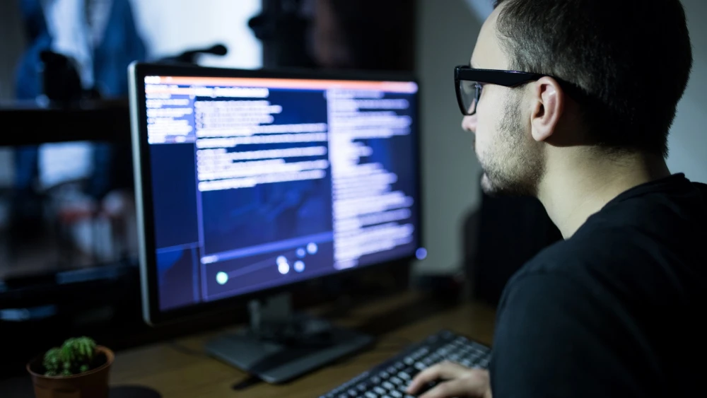 An illustration of a cyberattack. Credit: F8 studio/Shutterstock.