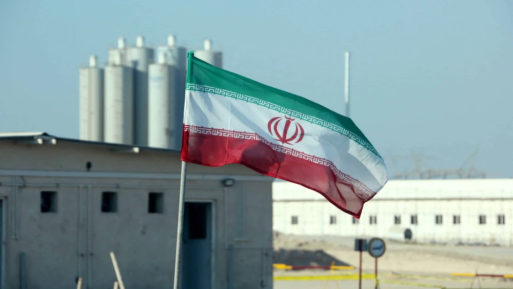 An Iranian flag in at the Bushehr nuclear power plant during a ceremony to kick-start works on a second reactor at the facility on Nov. 10, 2019. Photo by Atta Kenare/AFP via Getty Images.
