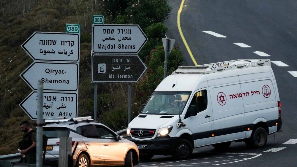 Ambulances evacuate injured people from the site of a Hezbollah rocket attack in Majdal Shams, July 27, 2024. Photo by Ayal Margolin/Flash90.