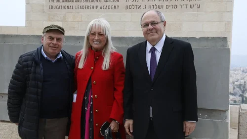 From left: Natan Sharansky, Dr. Miriam Adelson and Yad Vashem chairman Dani Dayan stand in front of the new Dr. Miriam and Sheldon G. Adelson Educational Leadership Academy at Yad Vashem. Credit: Yad Vashem.