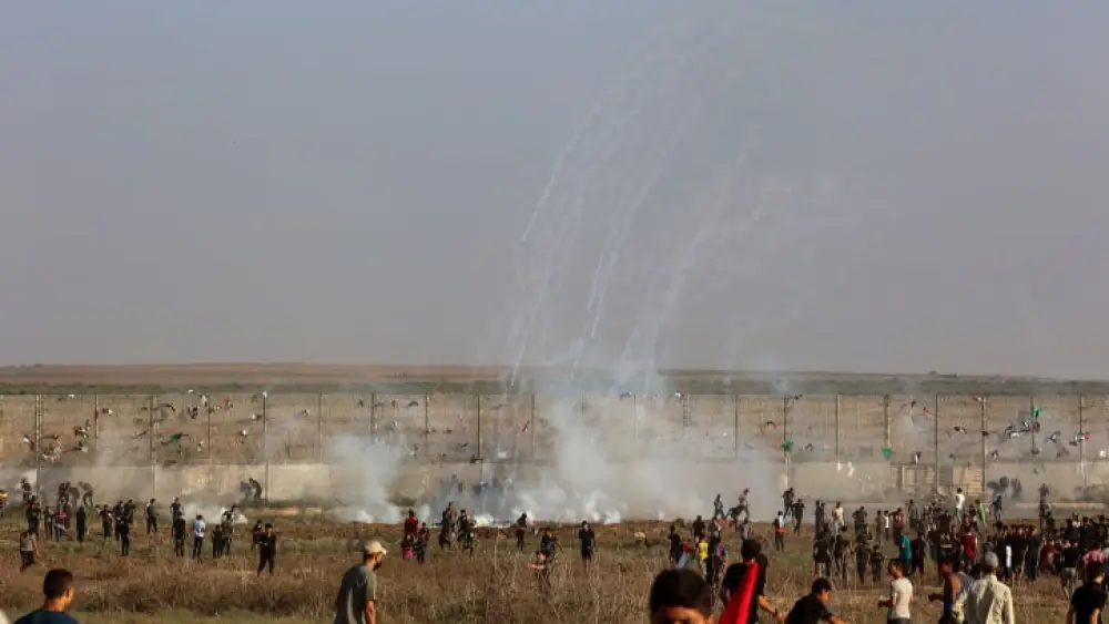 Palestinians riot at the Israeli border fence, east of Gaza City on Aug. 21, 2023. Photo by Atia Mohammed/Flash90.