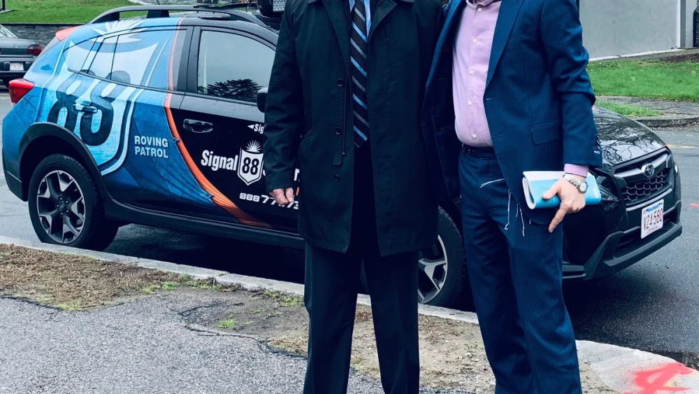 Bob Kinder, who served six years in the U.S. military in Iraq and Afghanistan, and is president and CEO of the safety and security consulting firm Talon Solutions, with Rabbi Mendy Krinsky. Source: Bob Kinder via Twitter.