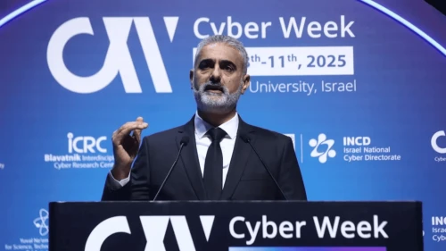 Yossi Karadi, director general of the Israel National Cyber Directorate, addresses the CyberWeek 2025 conference in Tel Aviv, Dec. 9, 2025. Credit: INCD.