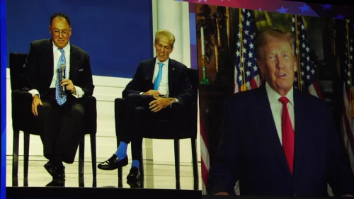 Republican Jewish Coalition CEO Matt Brooks (left) and National chairman Sen. Norm Coleman speak with former President Donald Trump, who appeared via satellite at the RJC's annual meeting, Nov. 19, 2022. Credit: Republican Jewish Coalition.