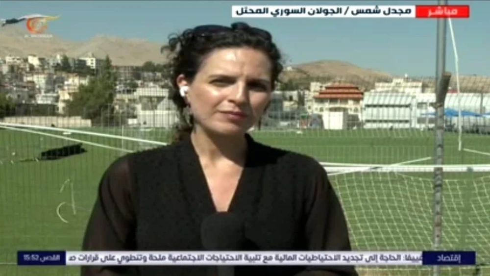Al Mayadeen reporter Hanaa Mahamid broadcasts live from Majdal Shams, where a rocket barrage fired by Lebanese Hezbollah killed 12 children, July 28, 2024. Credit: Screenshot/X.