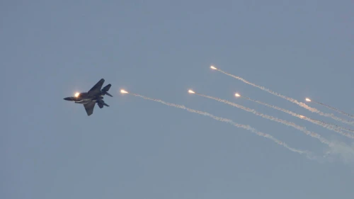 An Israeli F-15I fighter jet releases flares during a graduation ceremony of new Israeli Air Force pilots at the Hatzerim Air Force base near the southern city of Beersheba, Dec. 27, 2012. Photo by Flash90.