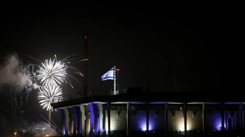 Fireworks from the Mount Herzl ceremony seen over the Knesset in Jerusalem, marking the beginning of celebrations for Israel's 71st Independence Day, May 8, 2019. Credit: Noam Revkin Fenton/Flash90.