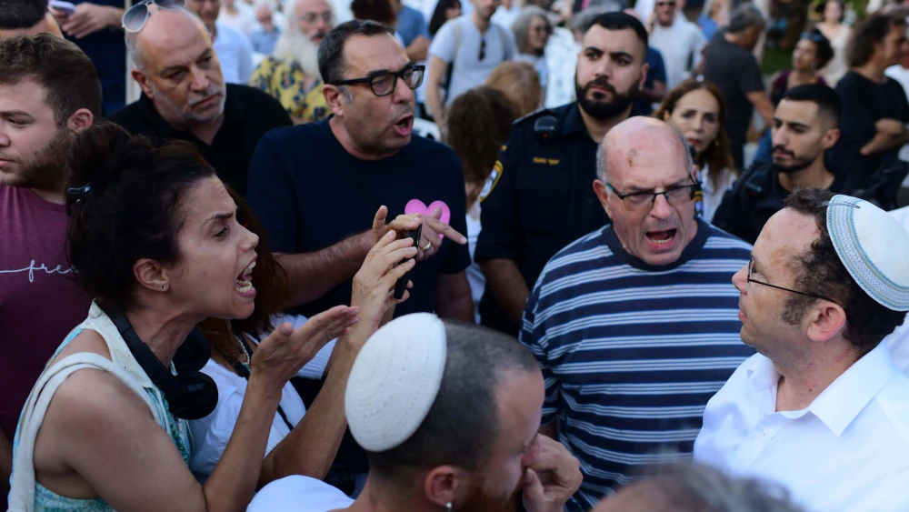 Secular and religious Jews argue at Dizengoff Square in Tel Aviv, Sept. 24, 2023. Photo by Tomer Neuberg/Flash90.