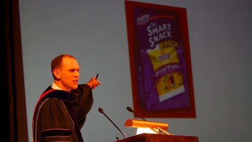 University of Chicago professor Austan Goolsbee (recently, the chair of the Council of Economic Advisers) looks at the hamantash-latke issue from an economics point of view during the school's debate in 2007. Credit: Courtesy of Daniel J. Libenson.