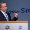 Israeli Prime Minister Benjamin Netanyahu speaks during the 37th World Zionist Congress conference at the Jerusalem Convention Center on Oct. 20, 2015. Photo by Yonatan Sindel/Flash90.