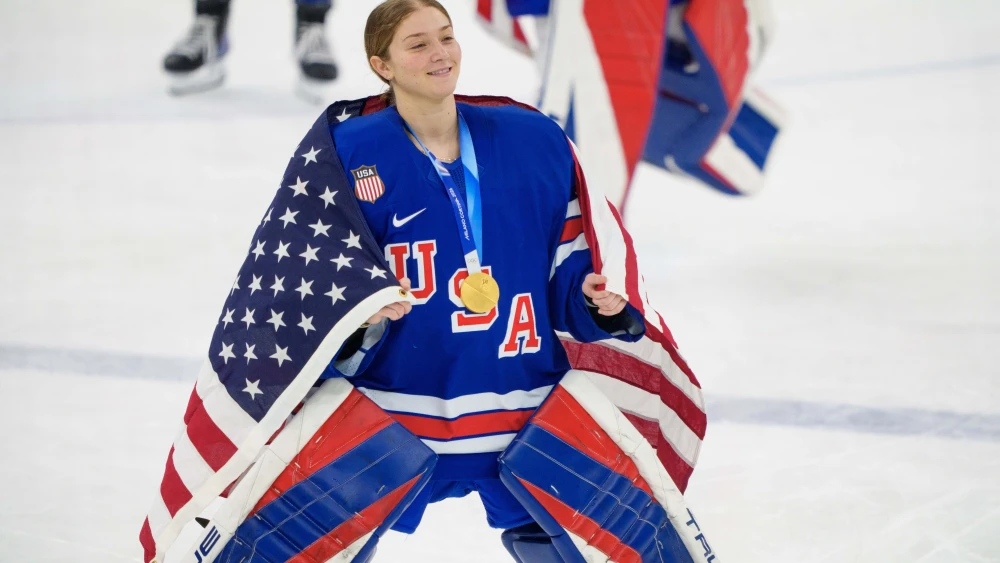 Aerin Frankel of Team United States celebrates victory in the Women’s Ice-Hockey Gold Medal Game, after a 2-1 win in overtime against Canada on day 13 of the Milano Cortina 2026 Winter Olympic Games in Italy, Feb. 19, 2026. Photo by EyesWideOpen/Getty Images.