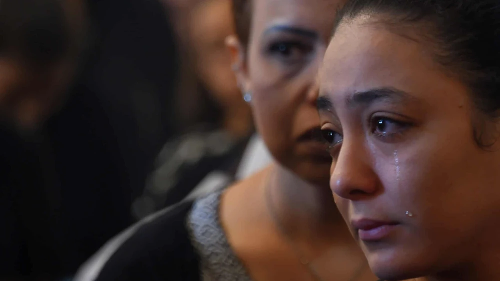 A Coptic Christian woman mourns victims killed in an attack a day earlier, during an early morning ceremony at the Prince Tadros church in Egypt's southern Minya province on Nov. 3, 2018. Photo by Mohamed El-Shahed/AFP via Getty Images.