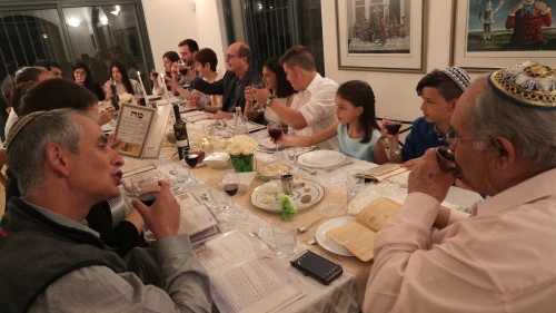 An Israeli family joins in the Passover seder last year on the first night of the Jewish holiday in Tzur Hadassah. Credit: Nati Shohat/Flash 90.