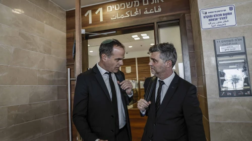 Lawyers gather outside the court hearing of Bezalel Zini, who is suspected of smuggling cigarettes into the Gaza Strip, at the Ashkelon Magistrate’s Court, Feb. 3, 2026. Photo by Tsafrir Abayov/Flash90.