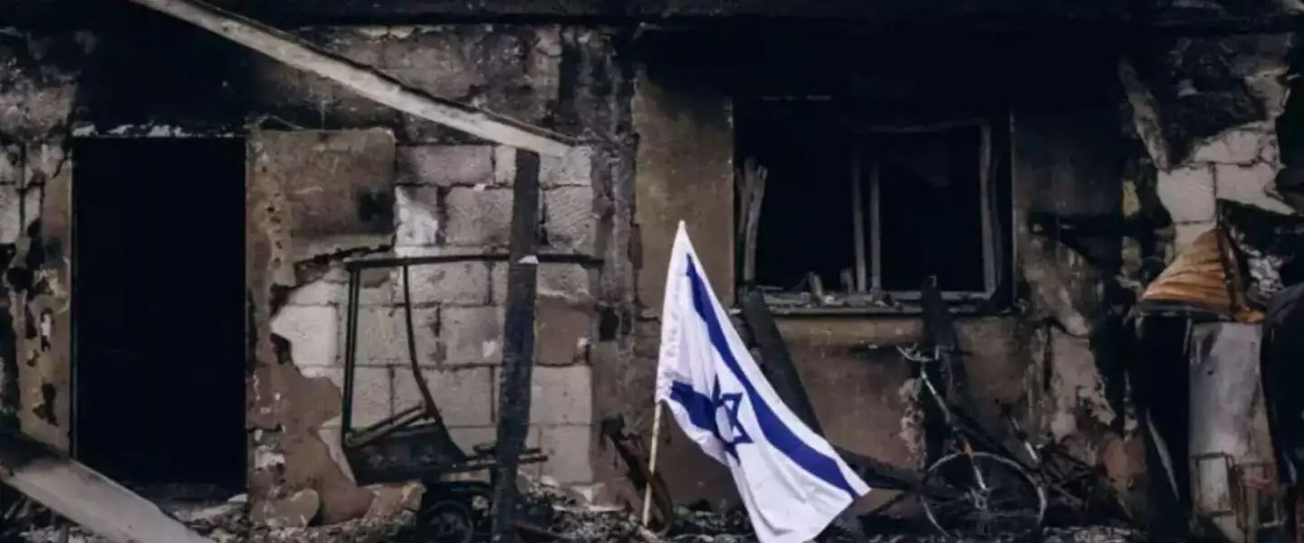 A burned home in Kibbutz Be’eri. Photo by Micha Brickman.