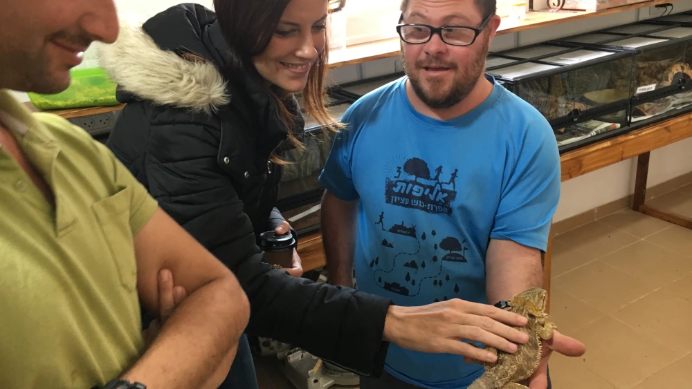 A Spanish journalist with the group visits a Gush Etzion communal village for young adults with disabilities. Credit: Josh Hasten.