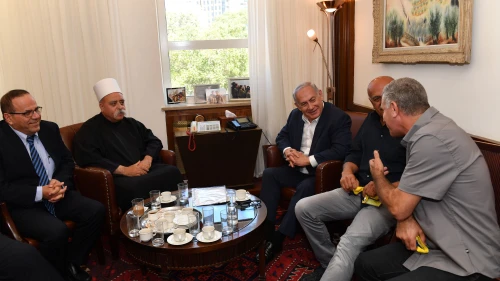 Israeli Prime Minister Benjamin Netanyahu meets with the leader of the Druze community in Israel, Sheikh Mowafaq Tarif (second from left), at the Prime Minister's Office in Jerusalem on July 27, 2018. Photo by Kobi Gideon/GPO.