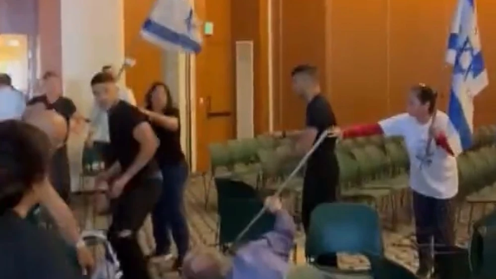 Anti-judicial reform protesters and hotel security and staff clash at the Pastoral Hotel in Kfar Blum, Israel, May 15, 2023. Source: YouTube.