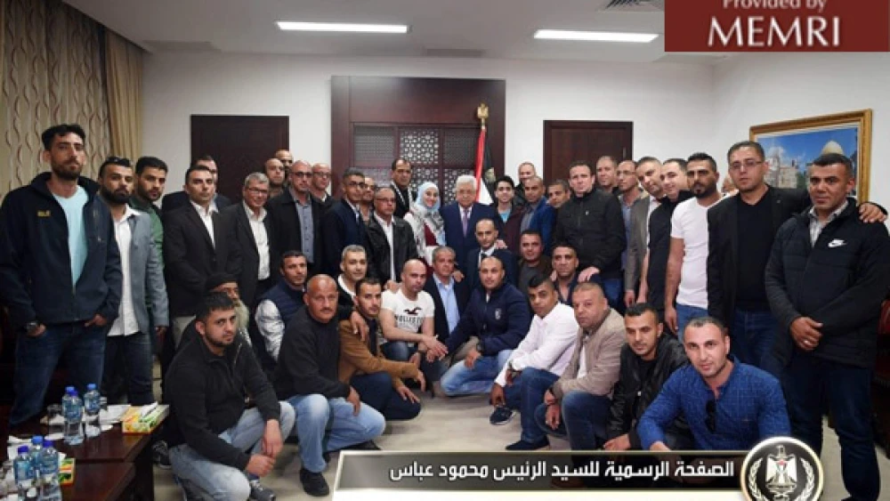 Palestinian Authority leader Mahmoud Abbas, center, meets with released prisoners who served 15-year sentences in Israeli prisons. Image: Facebook.com/President.Mahmoud.Abbas, April 22, 2018. (MEMRI)