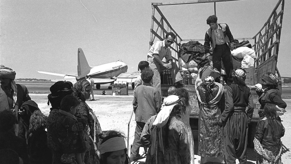 Iraqi Jews leaving Lod Airport in Israel on their way to Ma'abarot transit camps, 1951. Source: Israel Government Press Office.