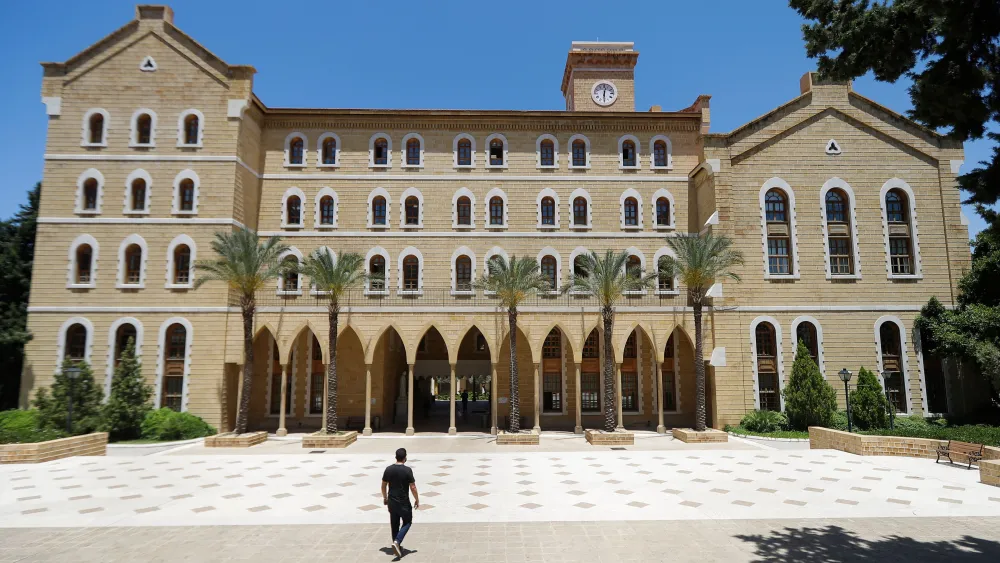 A student walks on the American University of Beirut campus, on June 1, 2020. Photo by Joseph Eid via Getty Images.