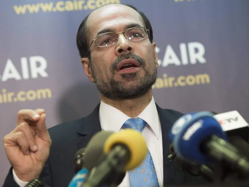 Council on American-Islamic Relations executive director Nihad Awad speaks about a lawsuit CAIR filed against U.S. President Donald Trump and his administration on the ban of travelers from seven countries by Executive Order, during a press conference at CAIR Headquarters in Washington, D.C., Jan. 30, 2017. Photo by Saul Loeb/AFP via Getty Images.