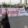 Iranian regime supporters hold a banner reading "Kill Trump" as they pay their respects to slain Supreme Leader Ali Khamenei at the Imam Khomeini Grand Mosque in Tehran, July 14, 2026. Photo by Majid Saeedi/Getty Images.