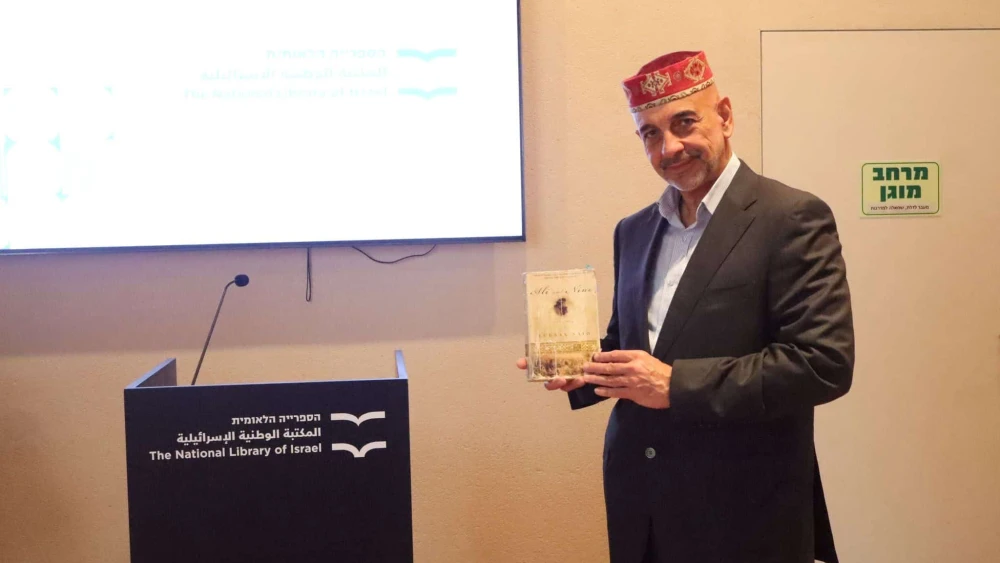 Historian Fuad Akhundov leads a discussion in Jerusalem on the Jews of Azerbaijan, Dec. 10, 2024. Credit: Azerbaijani Embassy in Tel Aviv.