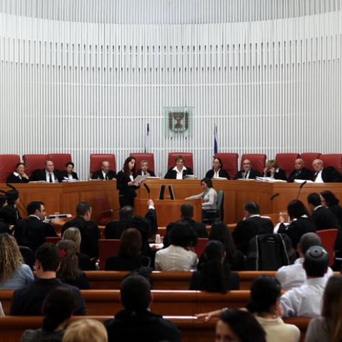 Eleven Israeli Supreme Court Justices deliberate on a petition related to Palestinian Arabs submitted by HaMoked, among other NGOs. Photo by Yossi Zamir/Flash 90.