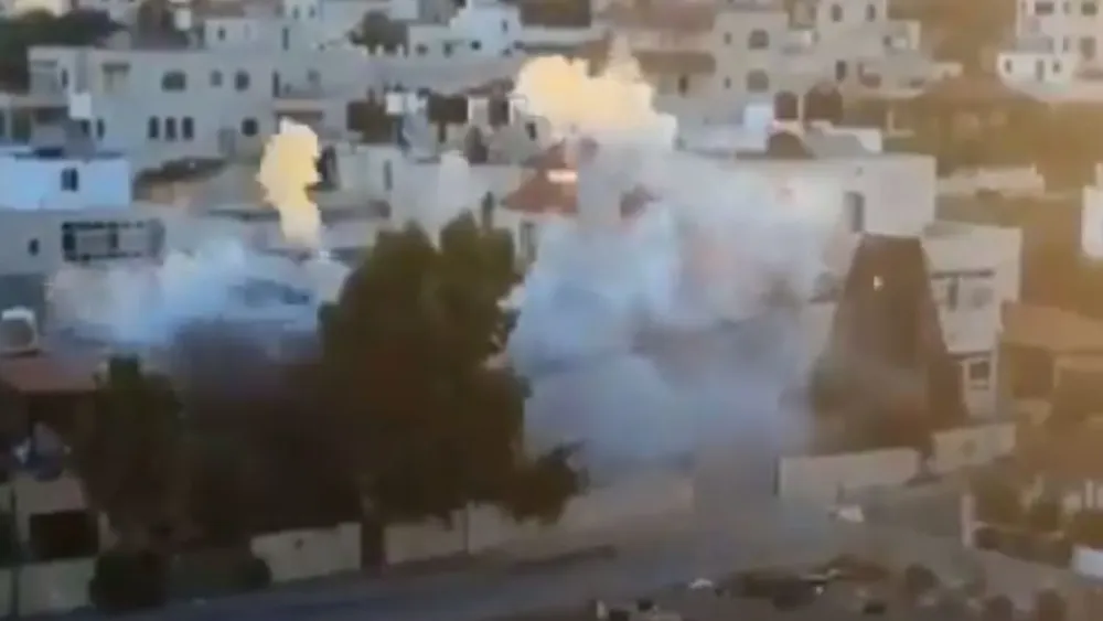 The Israel Defense Forces demolishes the home of accused terrorist Muntasir Shalabi in the village of Turmus Ayya, July 8, 2021. Source: Twitter.