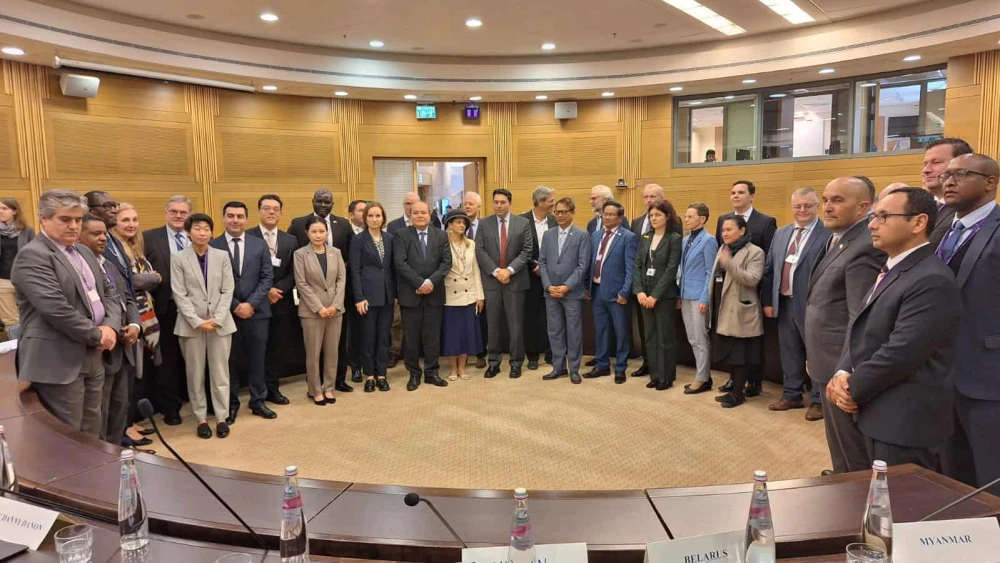 MKs Danny Danon (center, wearing red tie) and Ram Ben Barak (behind Danon's left shoulder) meet with foreign diplomats at the Knesset to discuss post-war Gaza, Jan. 10, 2024. Credit: The Knesset Spokespersons Office.