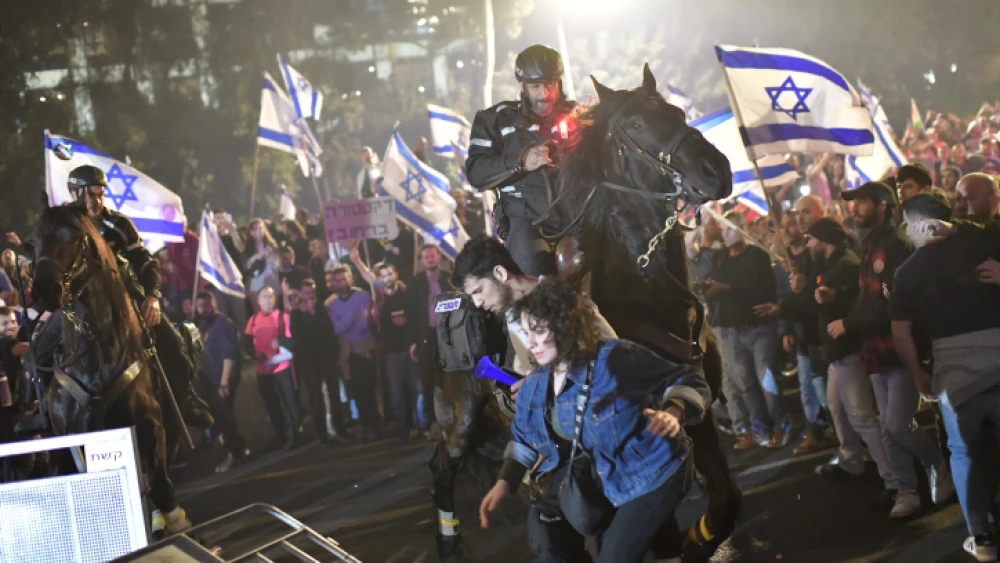 Israelis block the Ayalon Highway in Tel Aviv during a protest against the Israeli government's planned judicial overhaul on March 26, 2023. Photo by Tomer Neuberg/Flash90.