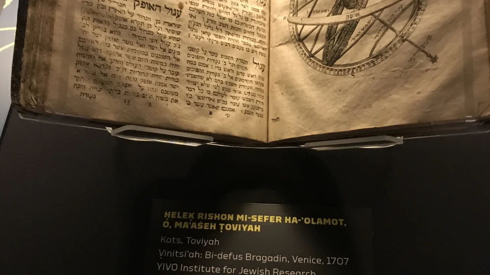An encyclopedic book discussing astrology, theology and other sciences on display in the "Jews in Space" exhibit. Credit: Shiryn Solny.