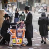 Haredi Jews in the Tel Aviv suburb of Bnei Brak, Feb. 27, 2024. Photo: Chaim Goldberg/Flash90.