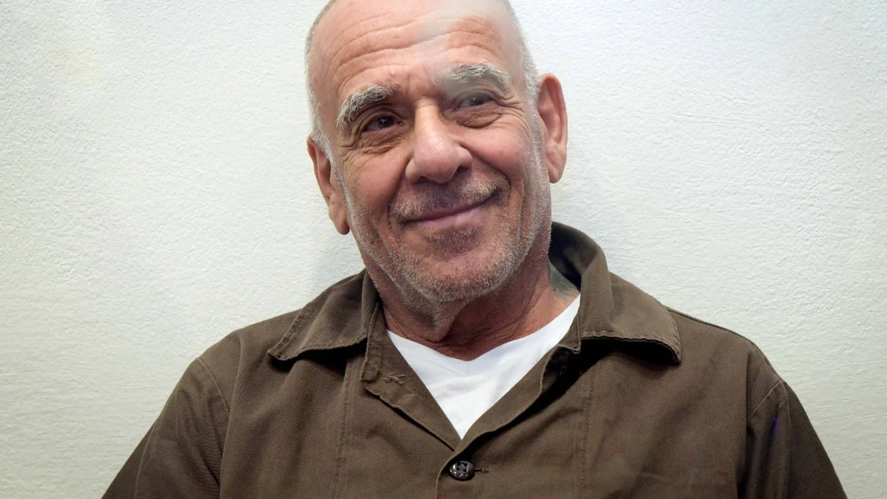 Moti Maman, 73, accused of visiting Iran twice and being in contact with Iranian intelligence agents, arrives at a Beersheva court for a hearing, Sept. 19, 2024. Photo by Dudu Greenspan/Flash90.