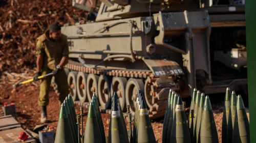 Israeli soldiers seen next to their artillery units near the Israeli border with Lebanon, northern Israel, Oct. 2, 2024. Photo by Ayal Margolin/Flash90.